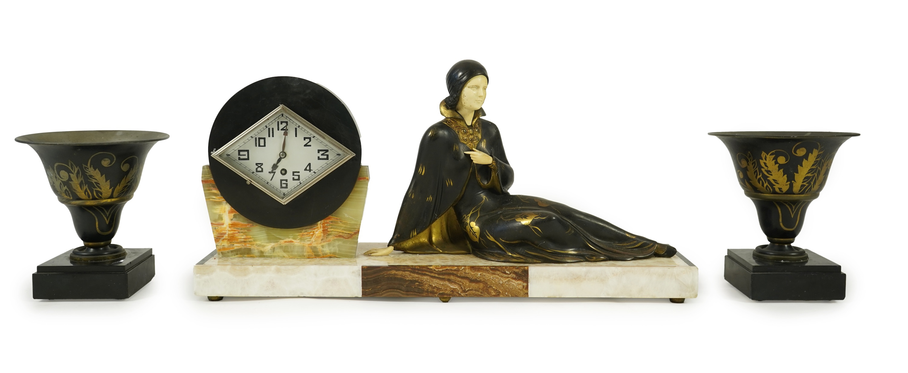 Attributed to Uriano (Ugo Cipriani, Italian, 1897-1960), a French Art Deco marble clock garniture